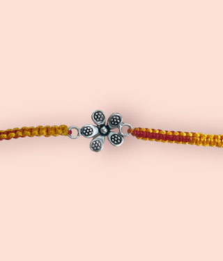 The Nirosha Silver Rakhi (Yellow)